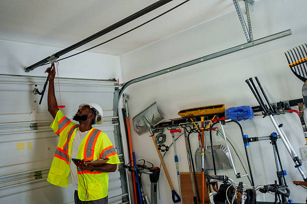 Professional Garage Door Panel Replacement technician working in Coos County County, OR
